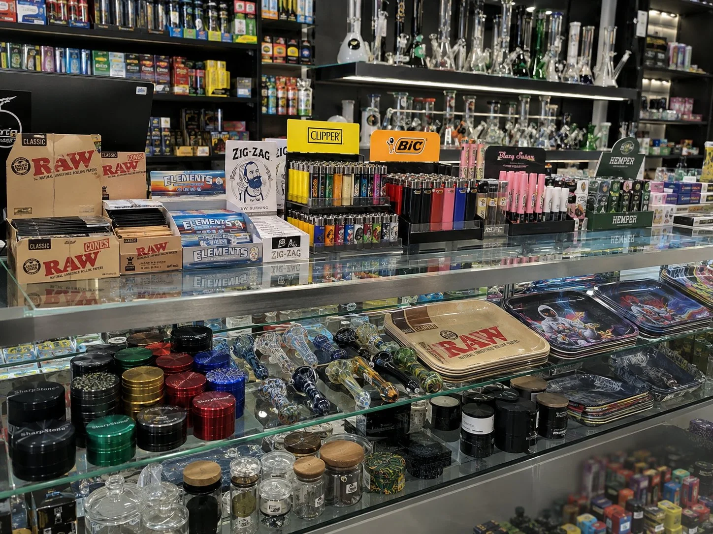 Grinders, pipes and accessories on the shelf at White Cloud 2 Smoke Shop